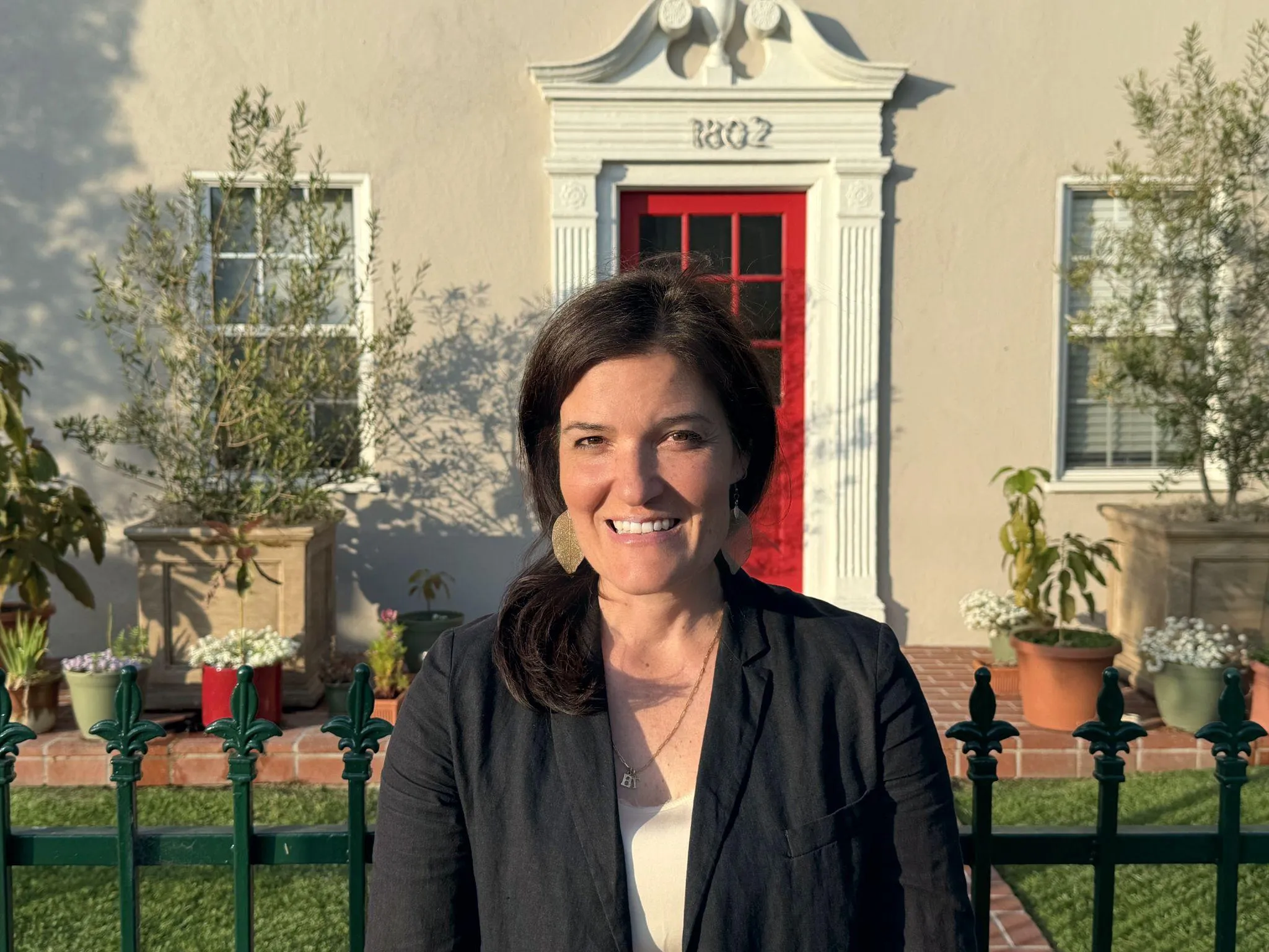 Heather Thomason in front of a Santa Monica apartment building